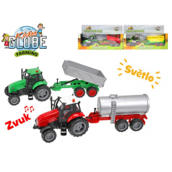 Traktor kov 25cm na setrvačník s vlečkou na baterie se světlem a zvukem 4druhy v krabičce